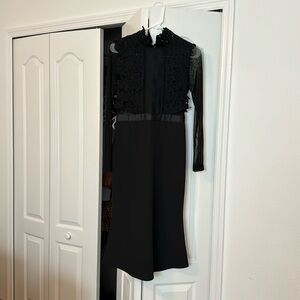 YYFS long sleeve black dress. Size small.